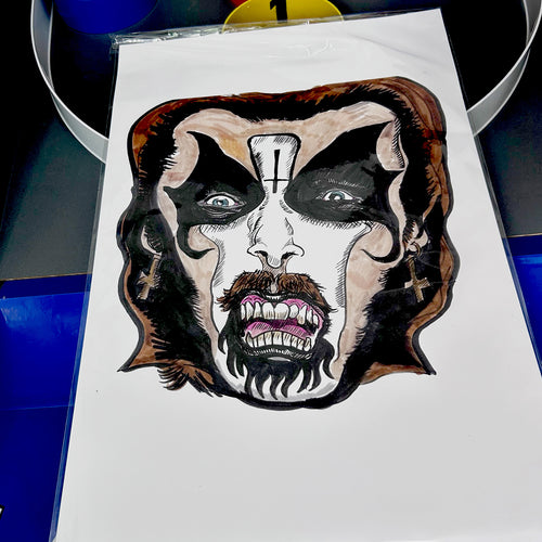 Close up of a pen and ink drawing of King Diamond, black and white makeup, and upside down cross in the middle of his forehead